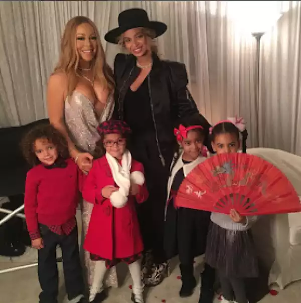 Beautiful photo of Beyonce, Mariah Carey and their kids backstage at a Christmas concert